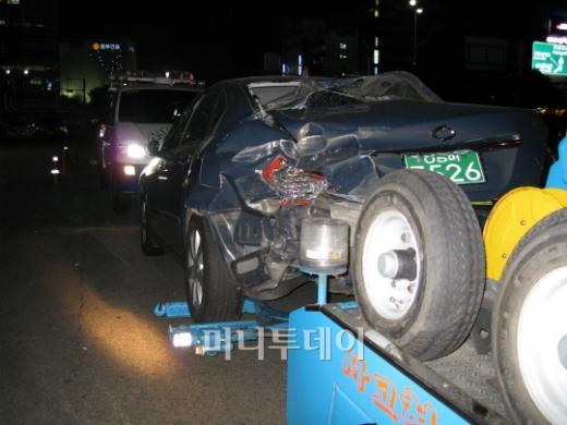 ↑ 주차돼 있다 사고를 당한 SM5 차량 ⓒ박종진 기자
