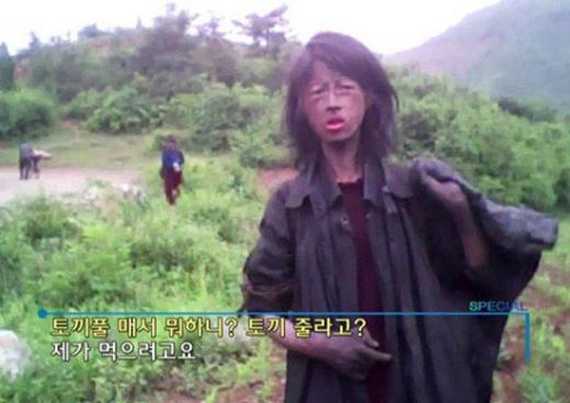 ↑지난 해 10월 KBS스페셜 '북한3대 권력세습 김정은, 그는 누구인가'편에 등장한 북한의 20대 '꽃제비 여성'. 이 여성은 결국 굶어죽은 것으로 전해졌다.