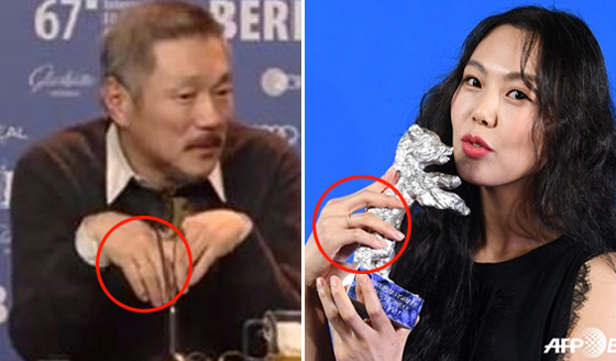 베를린영화제에 참석한 홍상수 감독(왼쪽)과 배우 김민희가 반지를 낀 모습. /AFPBBNews=뉴스1
