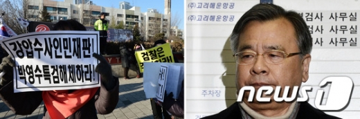 [사진]거세진 특검 비난시위...신변보호 받는 박영수