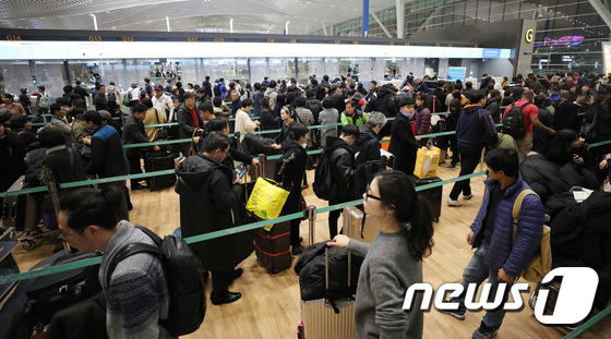 [사진]인천공항 제2여객터미널  개장 '출국 인파'