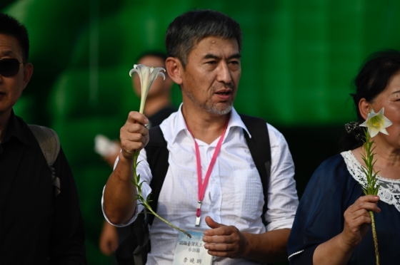 4일(현지시간) 대만 타이페이 치앙카이섹 기념홀에서 열린 톈안먼 30주년 추모행사에서 당시 사태 진압에 참여했던 리샤오밍 전 인민군 중위가 발언하고 있다. /사진=AFP