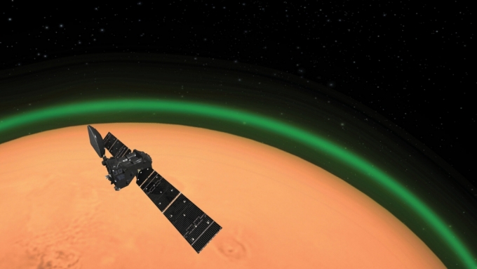 화성 궤도를 도는 TGO와 대기가 녹색으로 빛나는 모습을 그린 상상도. /사진=유럽우주국(ESA).