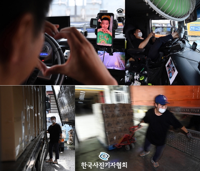 [사진] 한국보도사진상 우수상 ‘코로나 뚫고, 아빠는 오늘도 달린다’