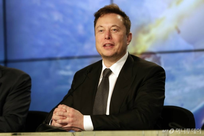 Elon Musk founder, CEO, and chief engineer/designer of SpaceX speaks during a news conference after a Falcon 9 SpaceX rocket test flight to demonstrate the capsule&#039;s emergency escape system at the Kennedy Space Center in Cape Canaveral, Fla., Sunday, Jan. 19, 2020. (AP Photo/John Raoux)