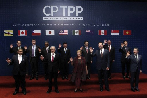 포괄적·점진적 환태평양경제동반자협정(CPTPP) 당사국 장관들이 2018년 3월 칠레에 모여 회담한 이후 기념 촬영을 하는 모습/사진=AFP