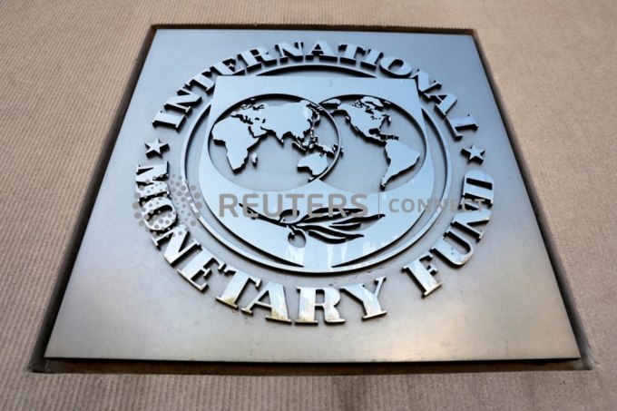 International Monetary Fund logo is seen outside the headquarters building during the IMF/World Bank spring meeting in Washington, U.S., April 20, 2018. REUTERS/Yuri Gripas/