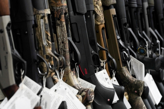 Hunting rifles are displayed for sale at Firearms Unknown, a gun store in Oceanside, California, U.S., April 12, 2021. REUTERS/Bing Guan/File Photo/File Photo /==1