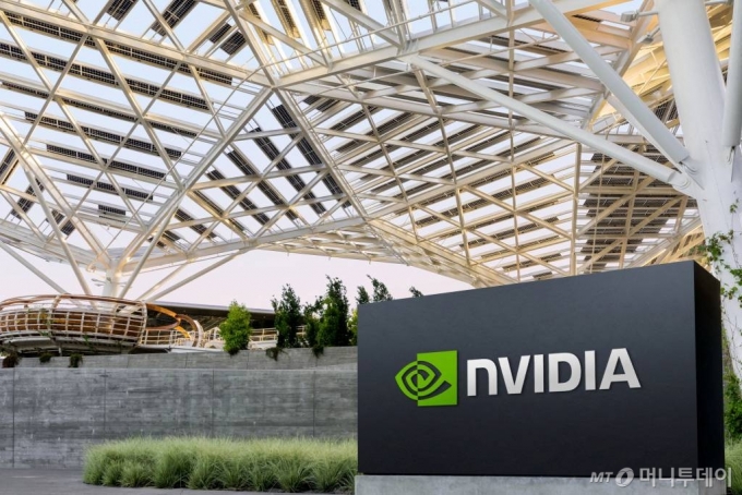 A Nvidia Corporation sign is shown in Santa Clara, Calif., Wednesday, May 31, 2023. AI chips and their leading designer, Nvidia, are now at the center of what some experts consider an AI revolution that could reshape the technology sector ? and possibly the world along with it. (AP Photo/Jeff Chiu)