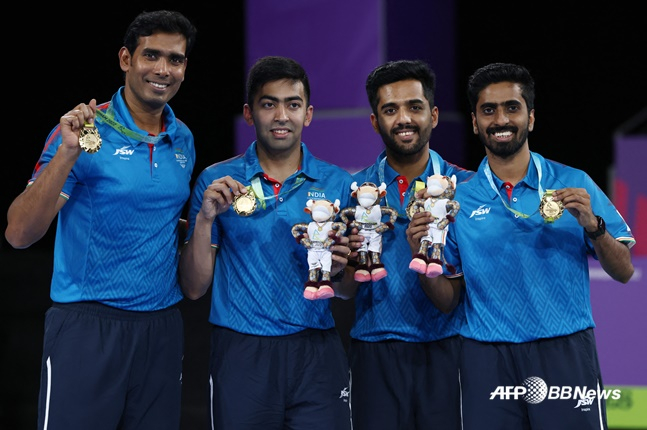 2022 버밍엄 커먼웰스 게임에서 남자 탁구 단체전 우승을 차지한 인도 선수들.  /AFPBBNews=뉴스1