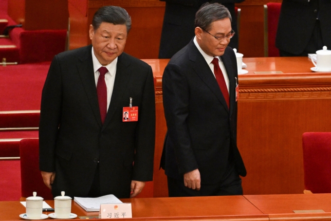 시진핑 중국 국가 주석과 리창 총리가 5일 (현지시간) 베이징 인민 대회당에서 열린 전국인민대표대회(전인대) 개막식에 도착을 하고 있다. 2024. 3. 5  /AFPBBNews=뉴스1