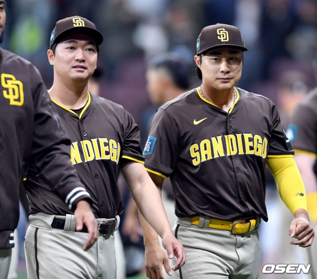 샌디에이고 파드리스 소속으로 2024 MLB 서울시리즈를 위해 한국을 찾았던 김하성(오른쪽)과 고우석. 고우석은 4일 트레이드를 통해 마이애미 말린스 유니폼을 입게 됐다.